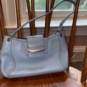 Light blue small ladies baguette style purse